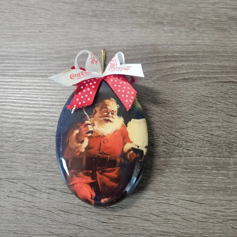 Coca-Cola Santa Claus Christmas Ornament Oval Haddon Sundblom Red Bow 4 Inch